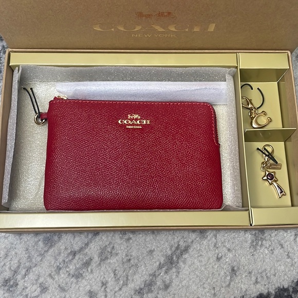 Coach Handbags - NIB Coach Wristlet & Charm Set